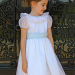 Susanne Lively Organza dress with ruffle collar. White/pink sash