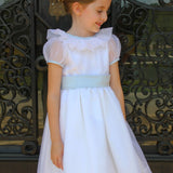 Susanne Lively Organza dress with ruffle collar. White/pink sash
