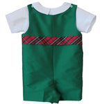 Susanne Lively Christmas green jon jon with red tartan waistband over a white Peter Pan collar shirt