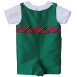 Susanne Lively Christmas green jon jon with red tartan waistband over a white Peter Pan collar shirt