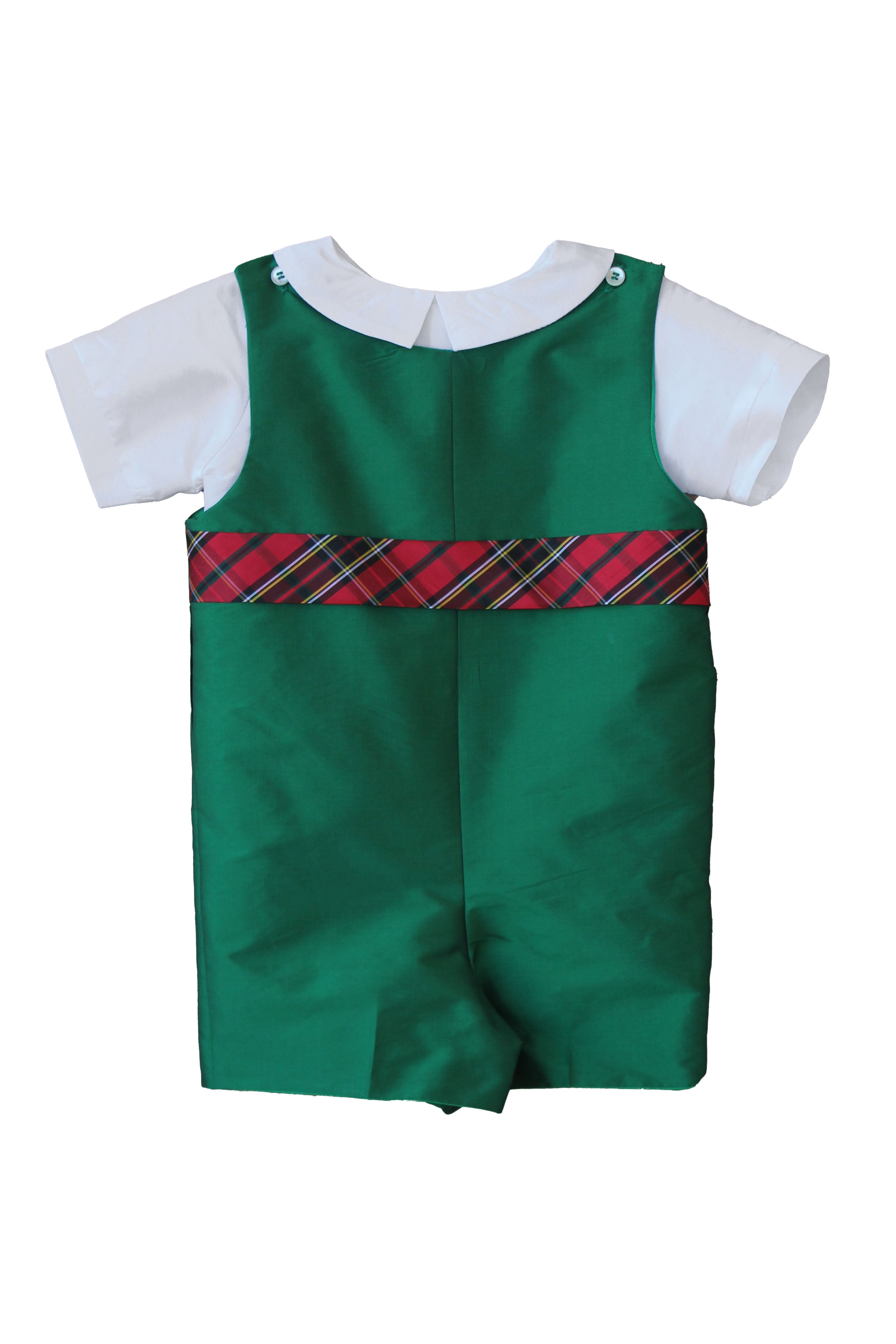 Susanne Lively Christmas green jon jon with red tartan waistband over a white Peter Pan collar shirt