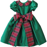 Back of the Susanne Lively green taffeta dress showing the plaid sash tied in a bow