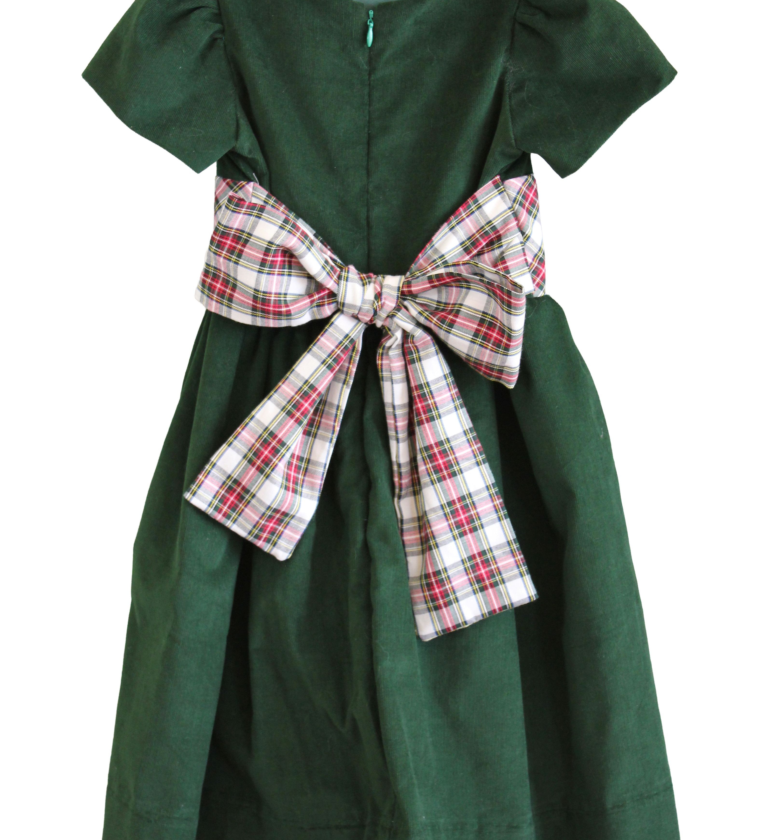 Back of the Susanne Lively green corduroy dress with the ivory tartan sash tied in a large bow