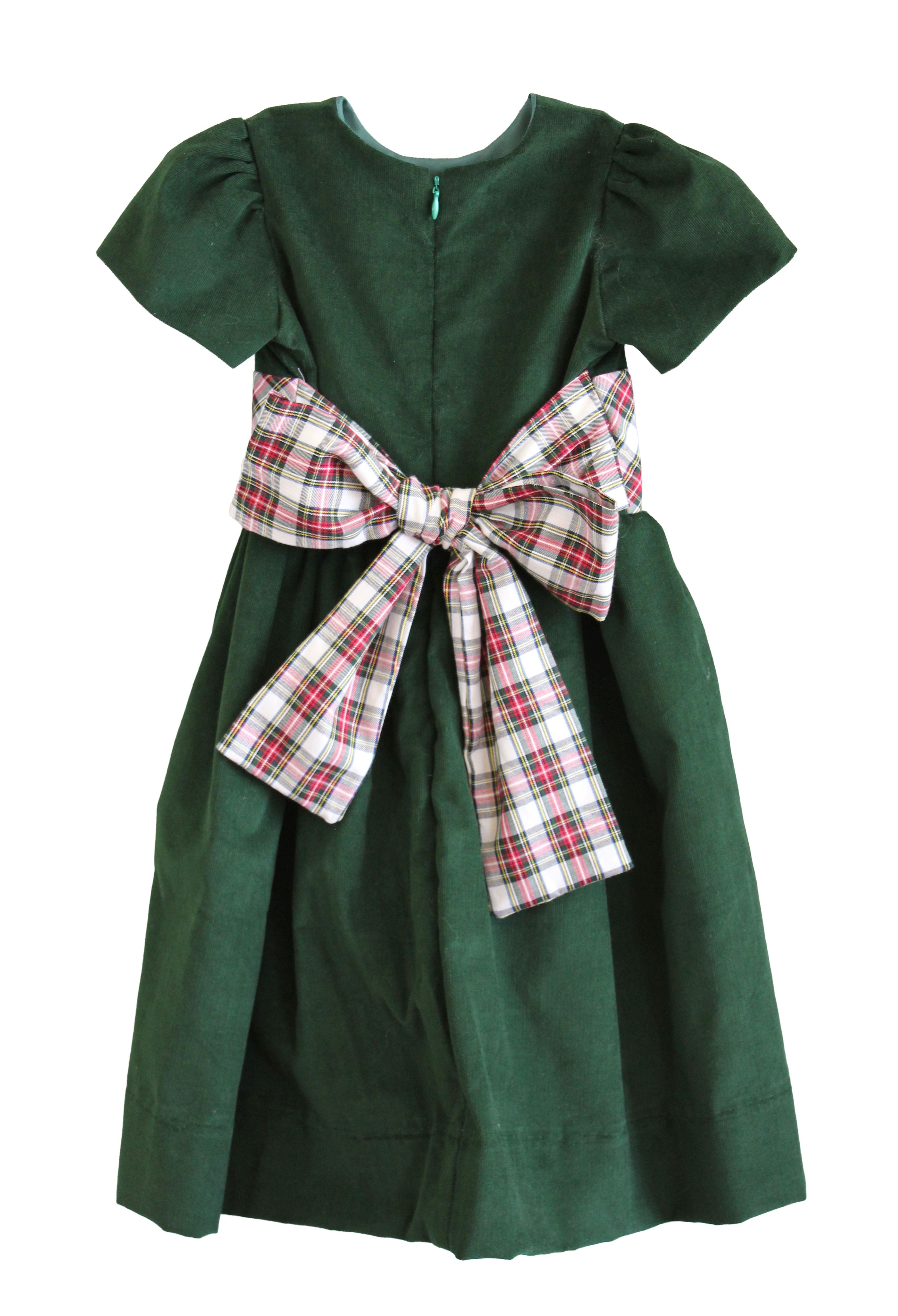 Back of the Susanne Lively green corduroy dress with the ivory tartan sash tied in a large bow