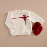 Close-up of the red Classic Mittens knit