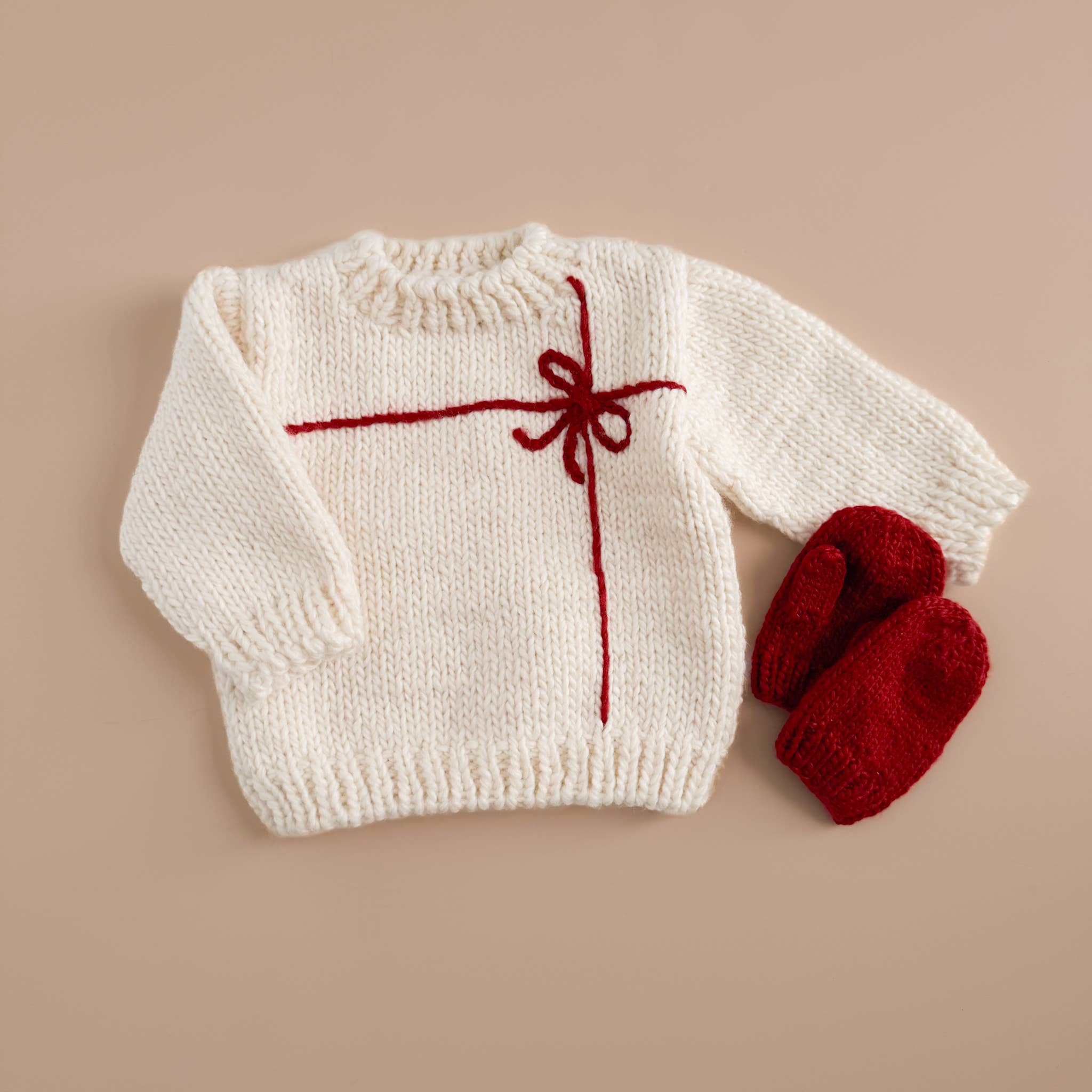Close-up of the red Classic Mittens knit