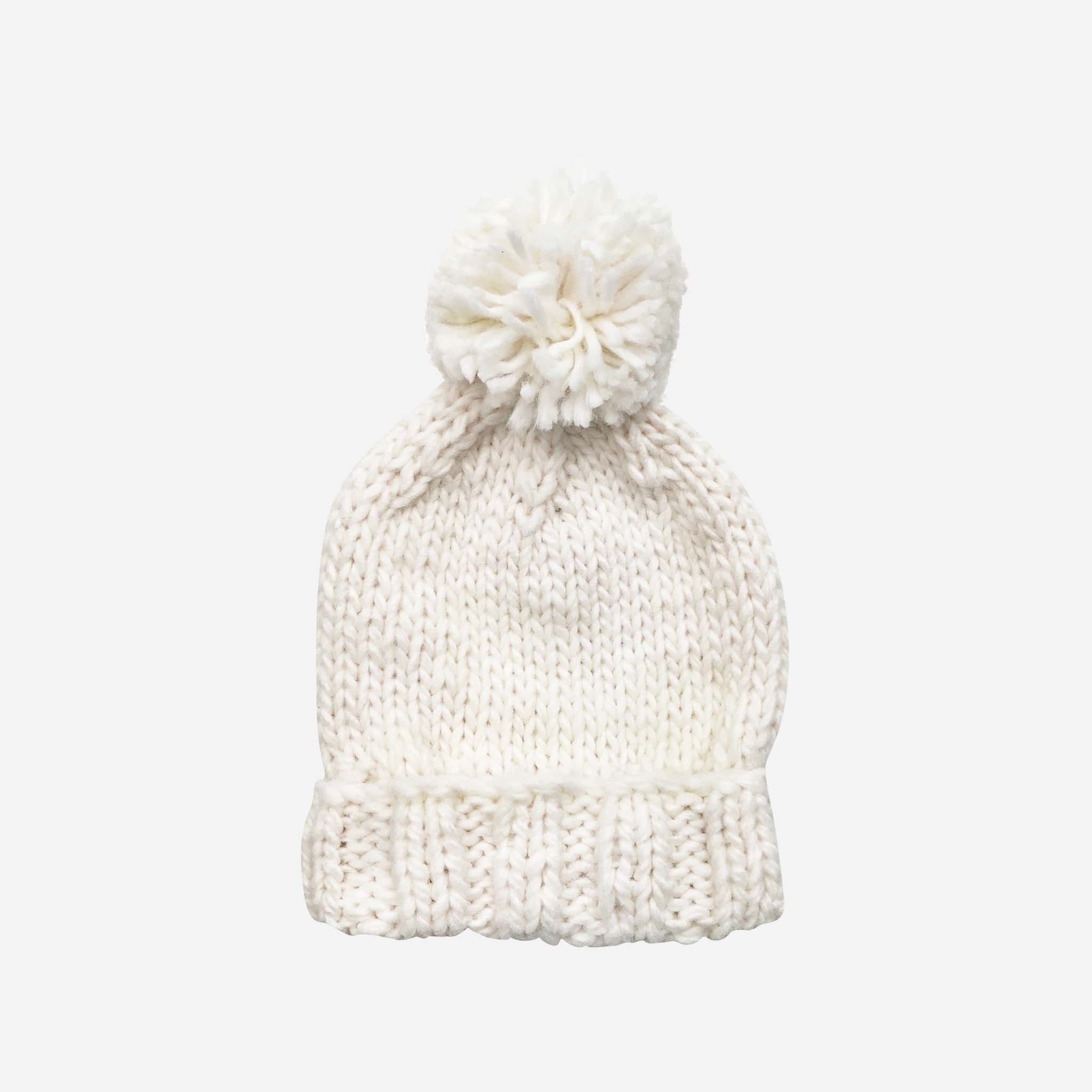 The Blueberry Hill Classic Pom Hat in cream