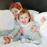 Lucy Tree Topper Bows romper styled for the holidays