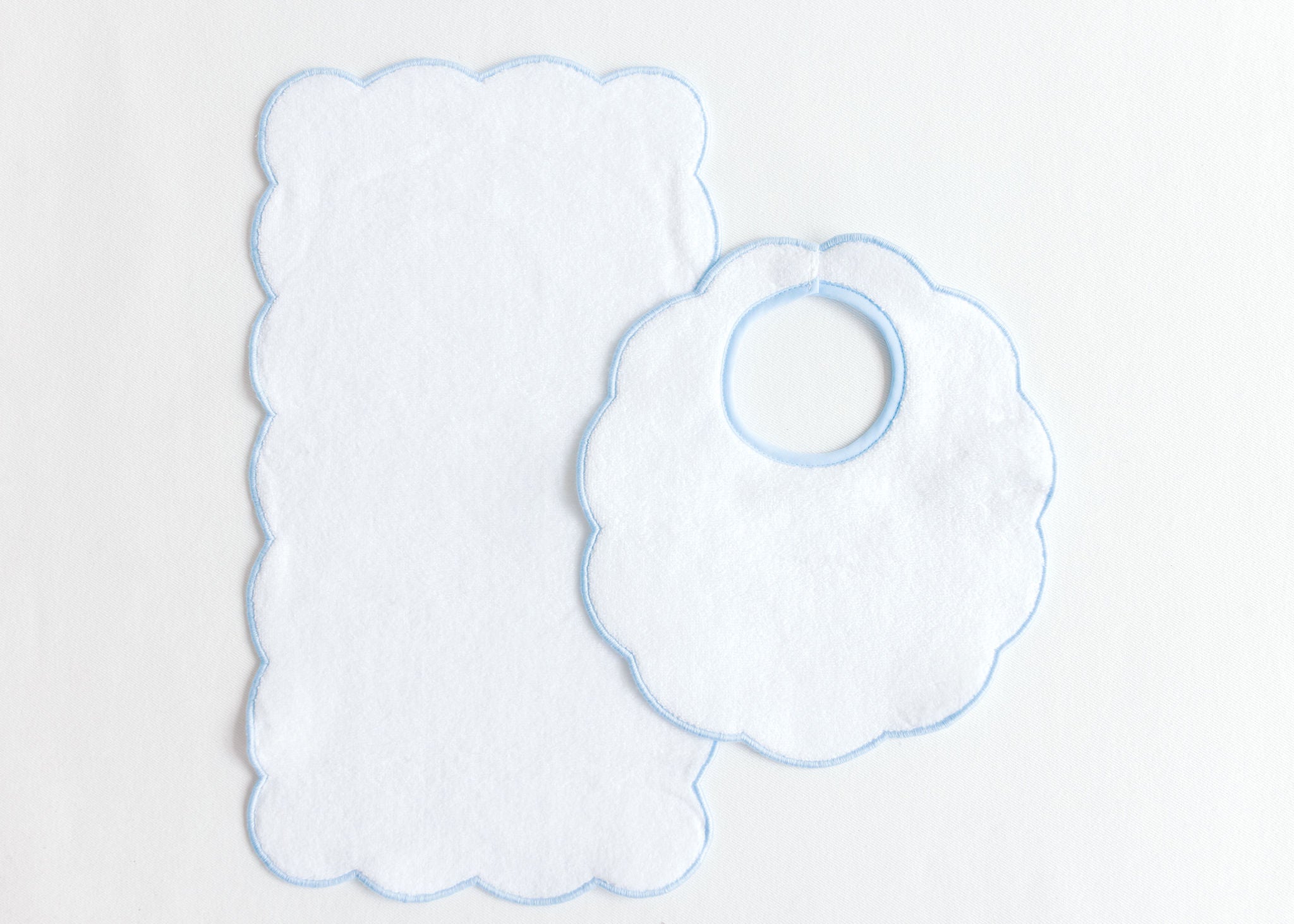 Terry Tots bib and burp set with blue scalloped edge