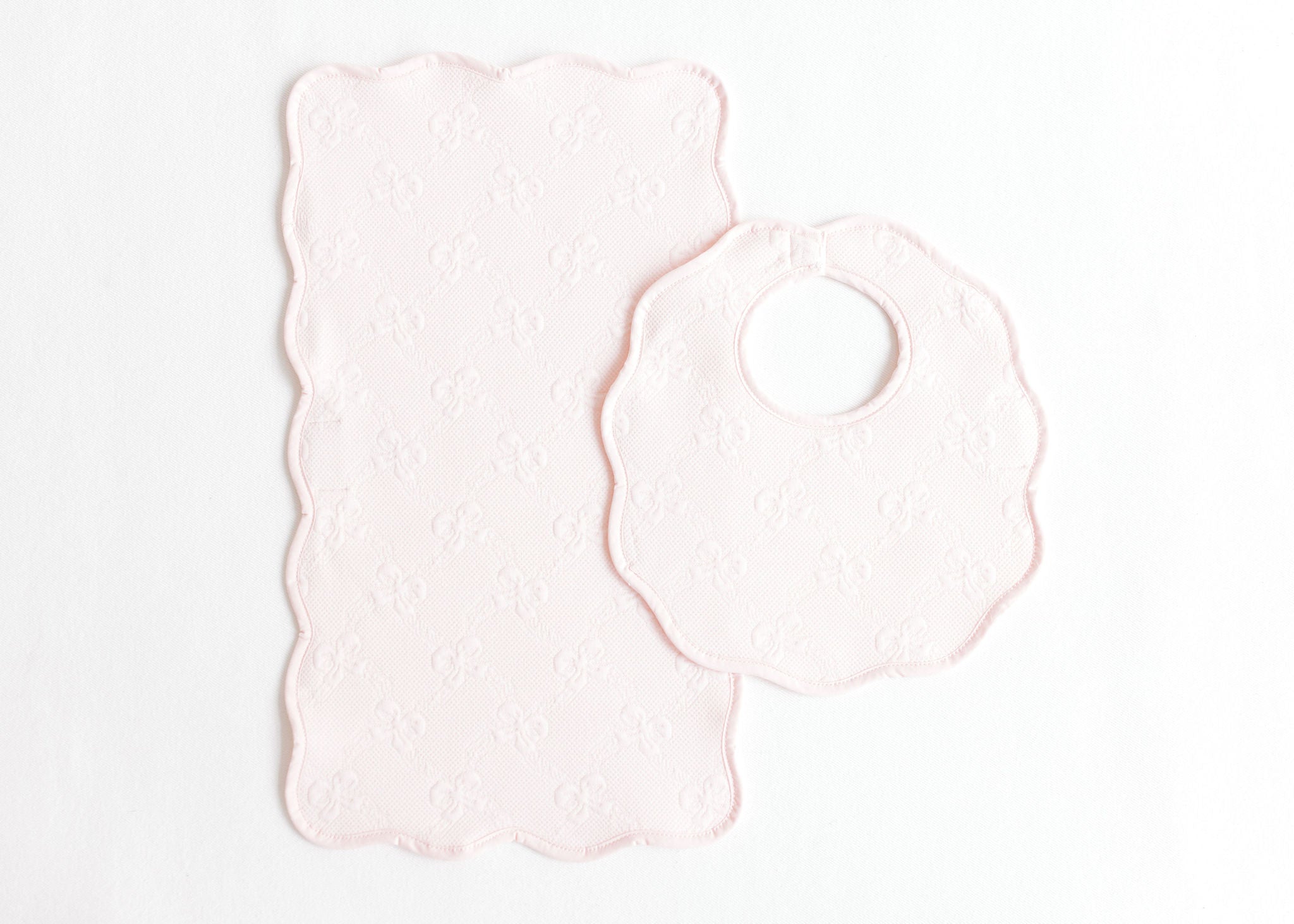 Terry Tots pink jacquard bows bib and burp set