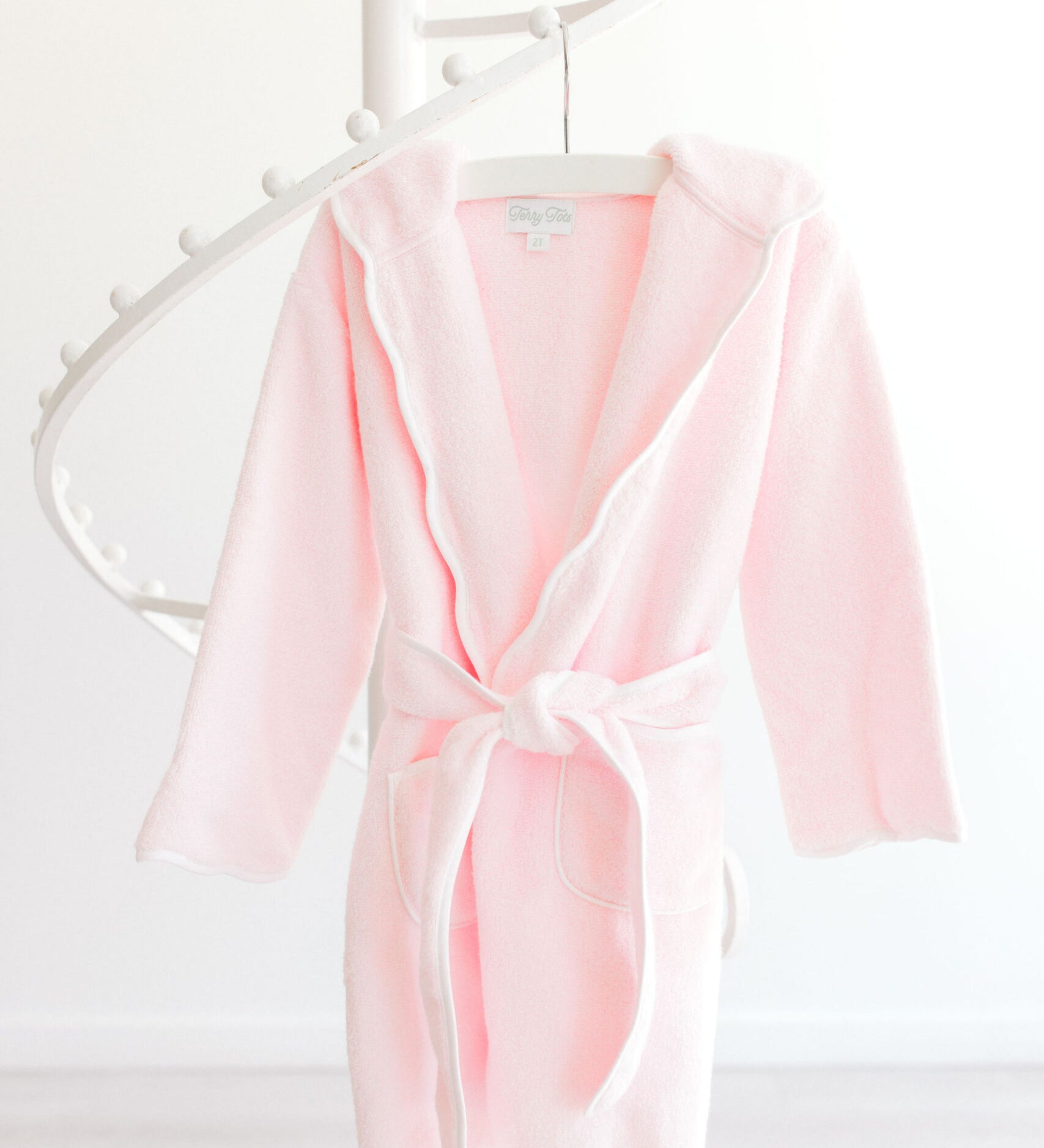 Terry Tots pink terry bathrobe with white scalloped trim and hood