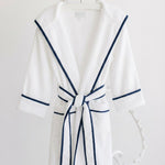 Terry Tots white terry bathrobe with navy trim and hood