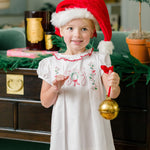 The Proper Peony Joyful Dress, white Christmas dress with red accents and hand embroidery