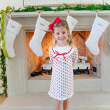 Girl wearing the Emersyn dress in Whimsical Santa