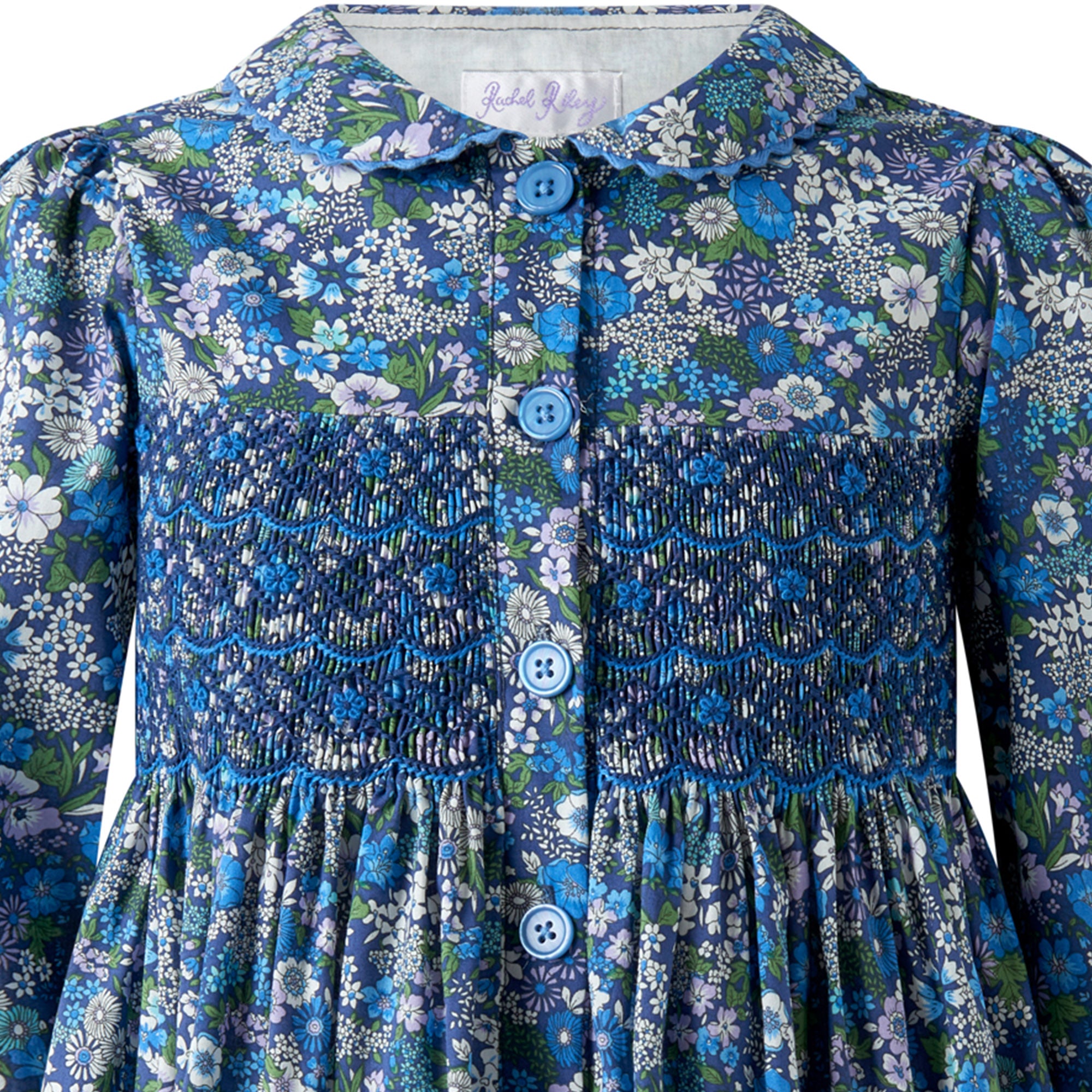 Smocking and Peter Pan collar detail on Rachel Riley Dahlia dress