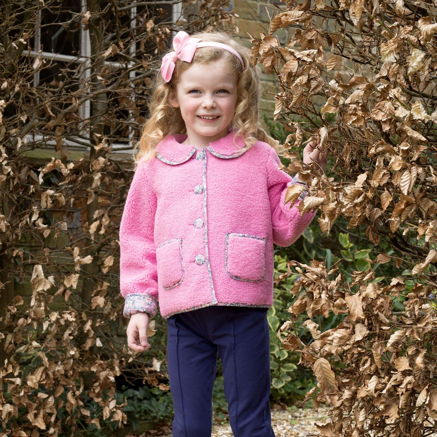 Rachel Riley Pink Shearling Floral Trim Jacket, styled
