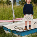 Child wearing the Copenhagen Colors Knitted Classic Rib Sweater in navy