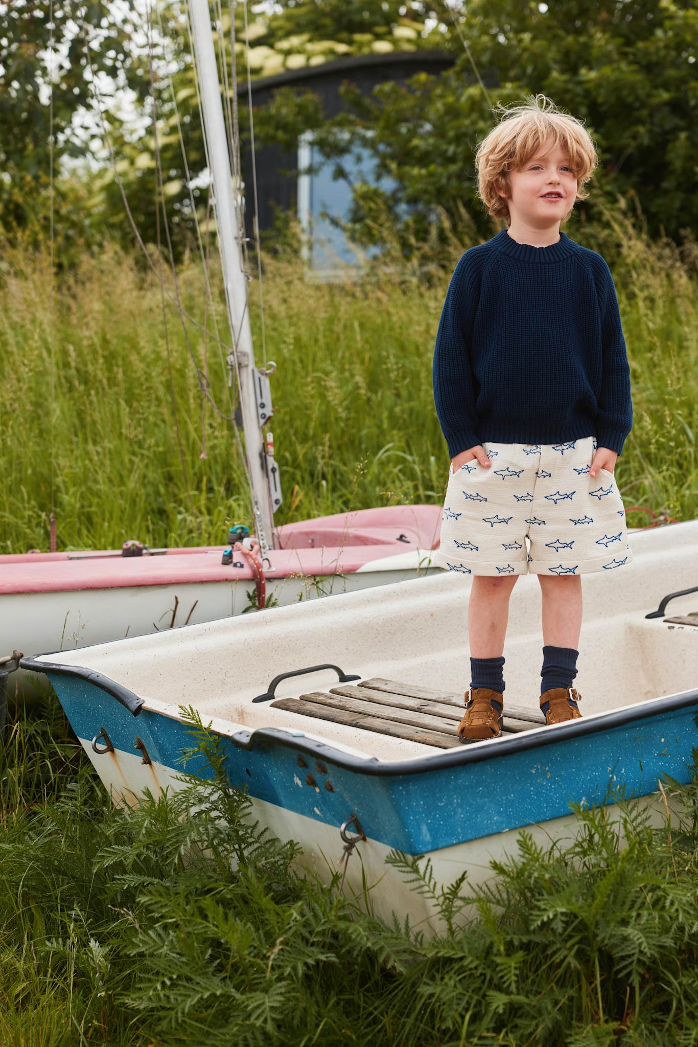 Child wearing the Copenhagen Colors Knitted Classic Rib Sweater in navy
