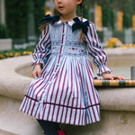 Antoinette Paris Marine stripe blue and burgundy smocked dress