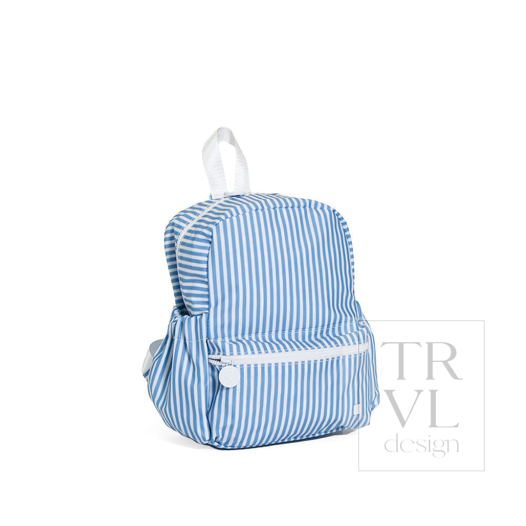 TRVL Mini Backer preschool backpack in Pimlico Stripe Chambray, a soft blue stripe coated cotton backpack with adjustable padded straps, shown from another angle