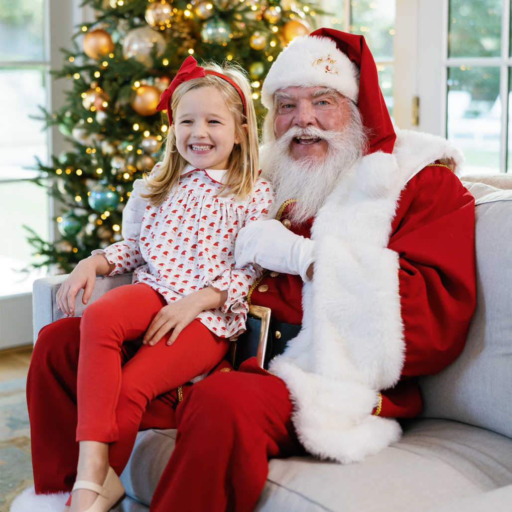 Girl wearing the Morgan legging set in Whimsical Santa