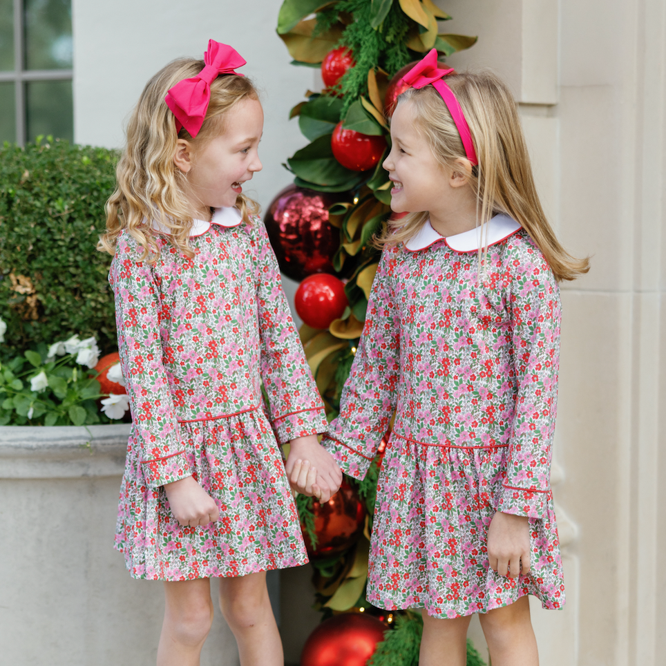 Girl wearing the Lillian dress in Floral Noel