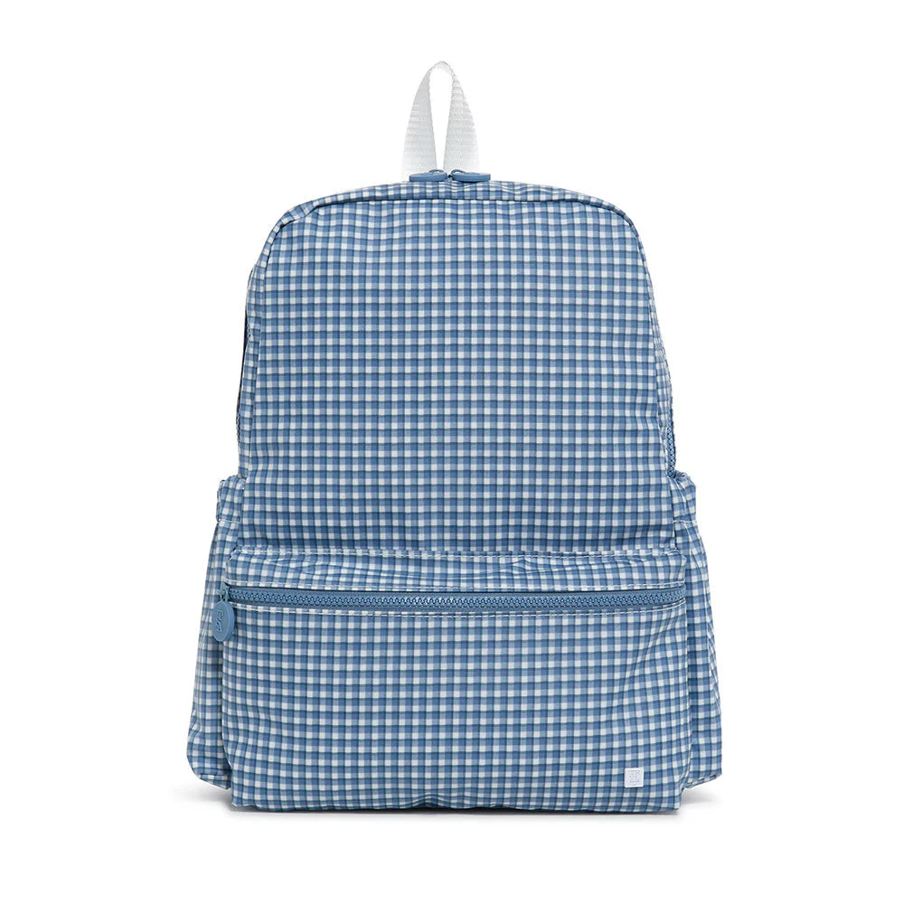 TRVL Backpacker kids' backpack in Rodeo Check Indigo, a deep indigo and white check coated cotton school backpack with a front zip pocket