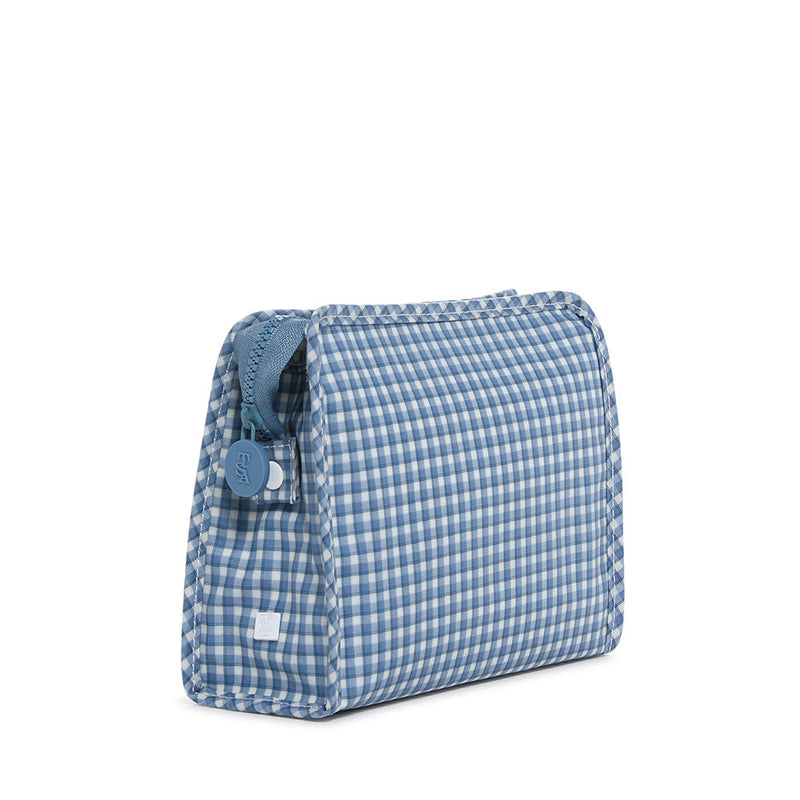 TRVL Roadie medium zip pouch in Rodeo Check Indigo, a deep blue and white check coated cotton pouch with a chunky zipper
