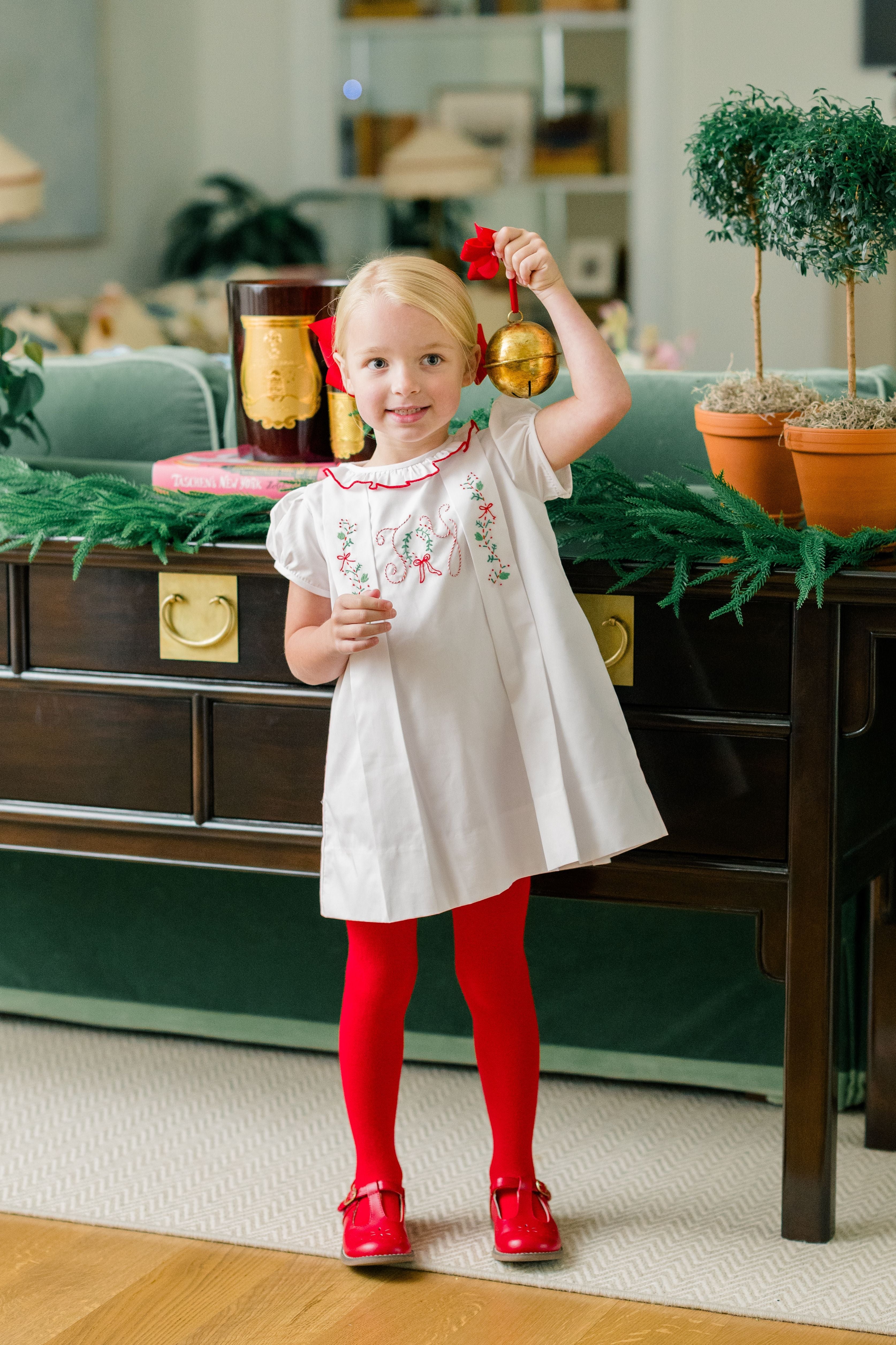 Girl wearing The Proper Peony Joyful Christmas dress