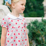 Girl wearing The Proper Peony Apple Blossom tunic set