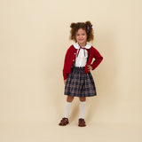 Kidiwi Louise navy plaid smocked skirt, side view