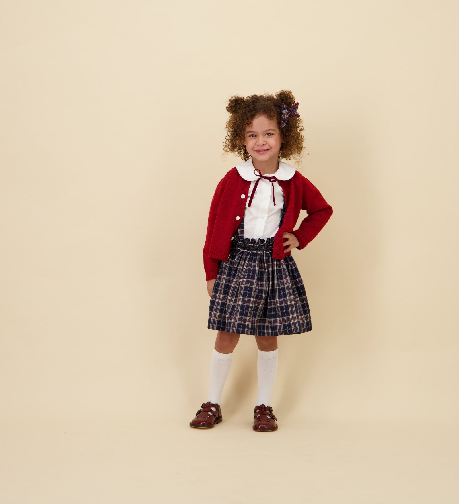 Kidiwi Louise navy plaid smocked skirt, side view