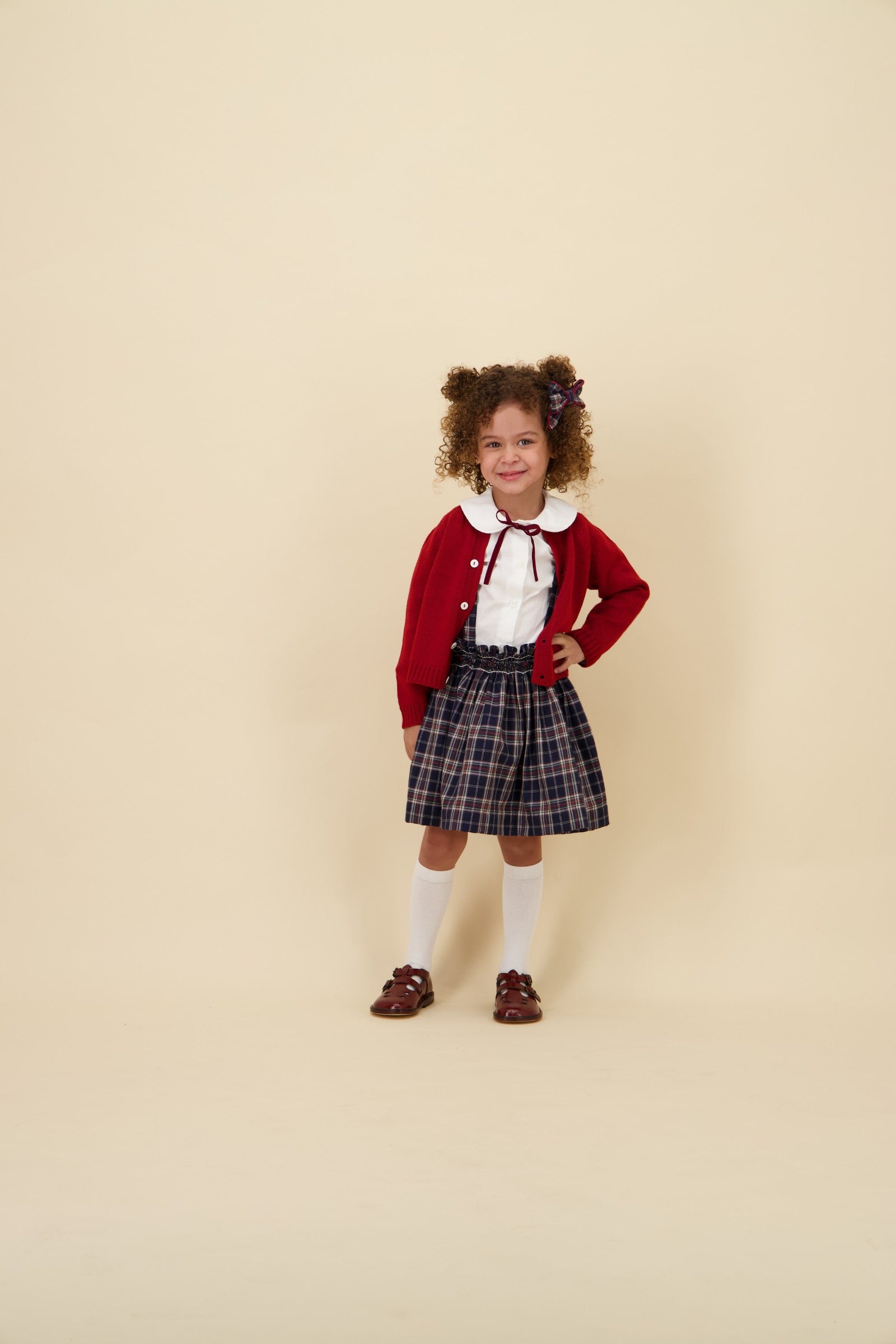 Kidiwi Louise navy plaid smocked skirt, side view